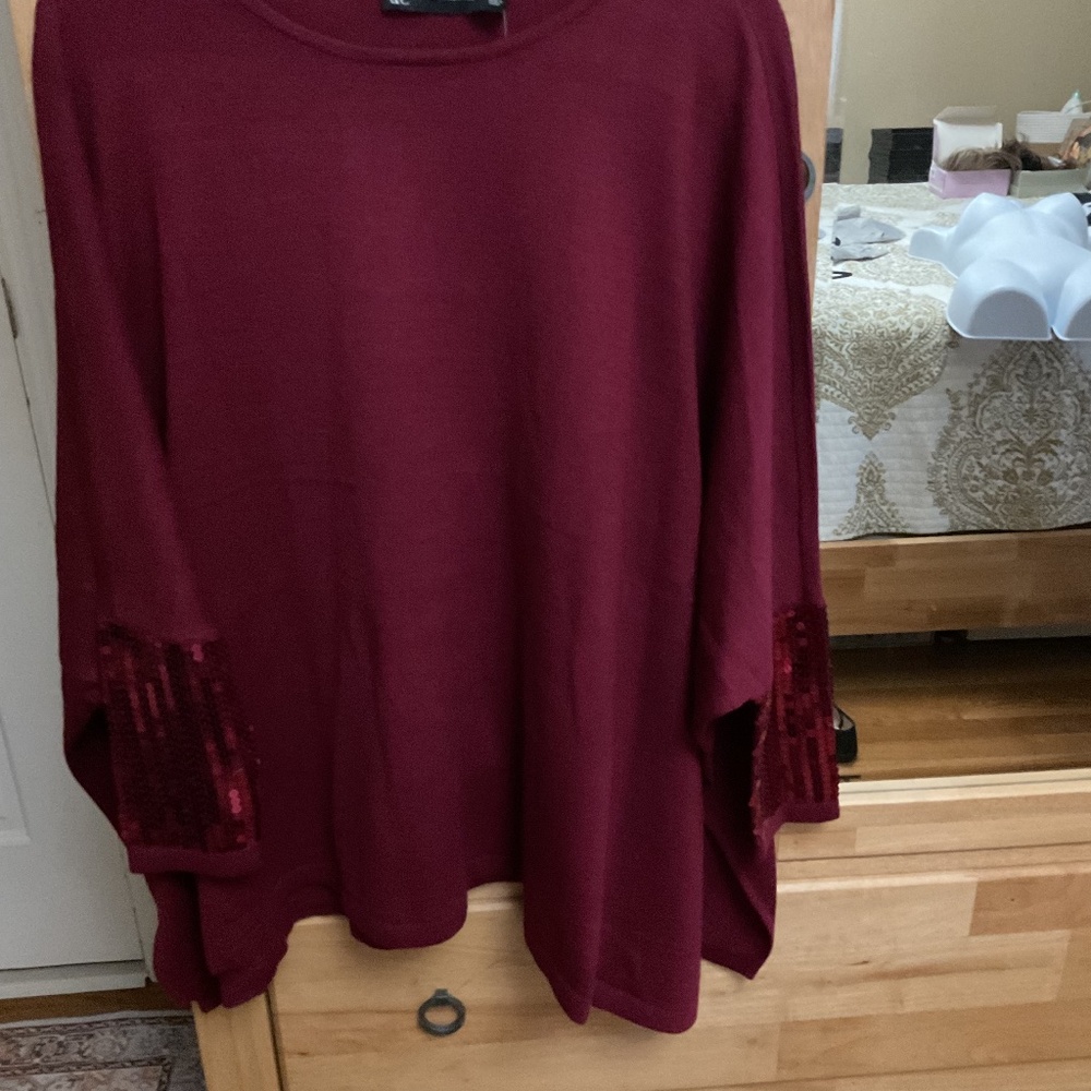 Embellished poncho type sweater